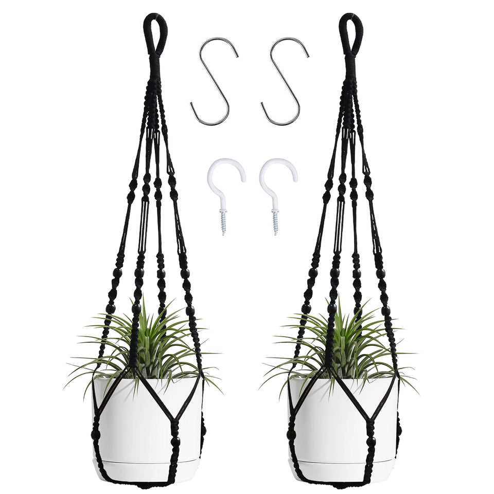 BlueMake macrame plant hanger with wood beads in black holding a pot