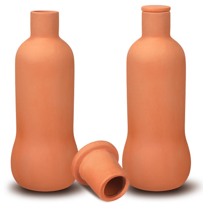Blushtier Olla terracotta pot with lid for controlled watering in home planters.