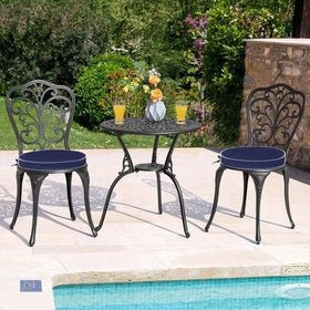 Blytieor two-pack round cushions on standard chairs for versatile seating.