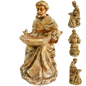 Bolvoud St. Francis statue with bird feeder in garden inviting wildlife.