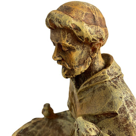 Bolvoud St. Francis statue educational décor prompting care for creatures.