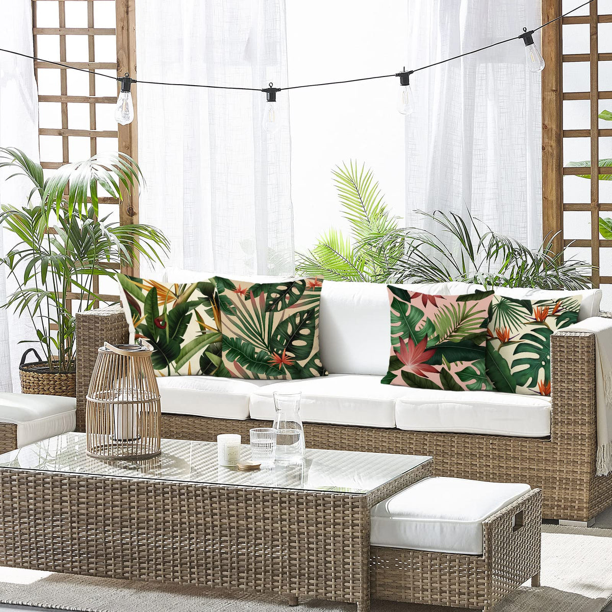 Bonhause pillow cover with monstera design, enhances outdoor lounge ambiance.