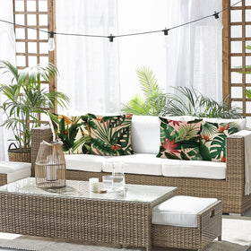 Bonhause pillow cover with monstera design, enhances outdoor lounge ambiance.