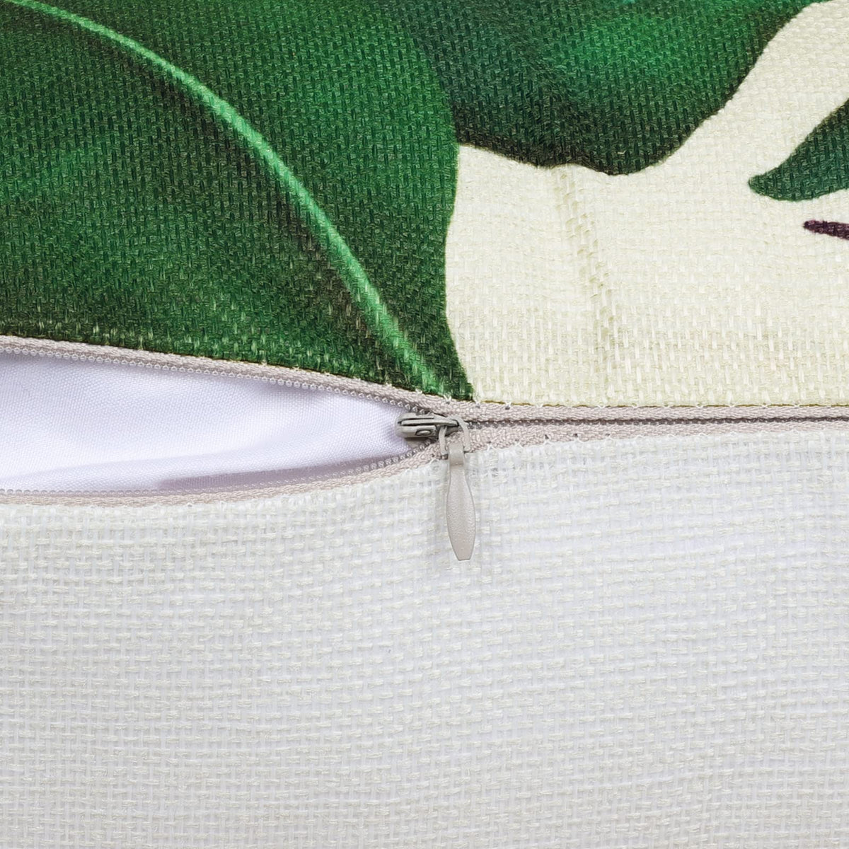 Bonhause tropical leaves cover with invisible zipper for easy replacement.