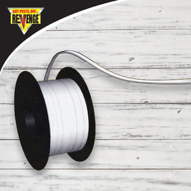 Bonide Revenge tape hanging in a kitchen to deter pests.