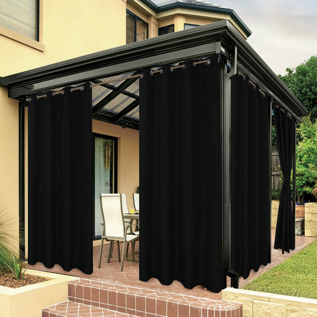 BONZER outdoor curtain 54x84 in black provides private shade for patios.