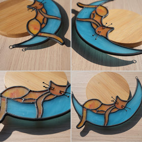 BOXCASA orange cat window decor offers a charming gift for cat lovers.