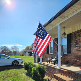 Bradford flag with three brass grommets offers easy secure mounting for home exteriors