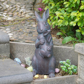 Braxio Bunny garden statue with copper finish adds curb appeal.
