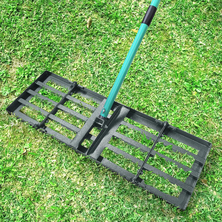 Breeze Touch lawn leveling rake with a 48-inch head smoothing turf