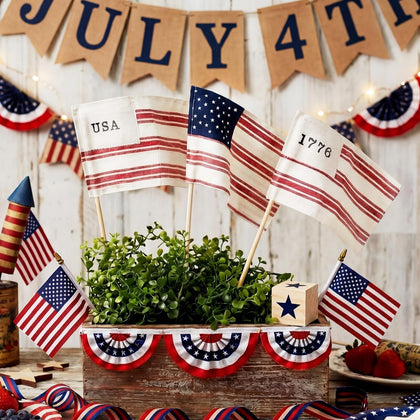Breling six mini American flags on sticks ready for indoor and outdoor patriotic displays.