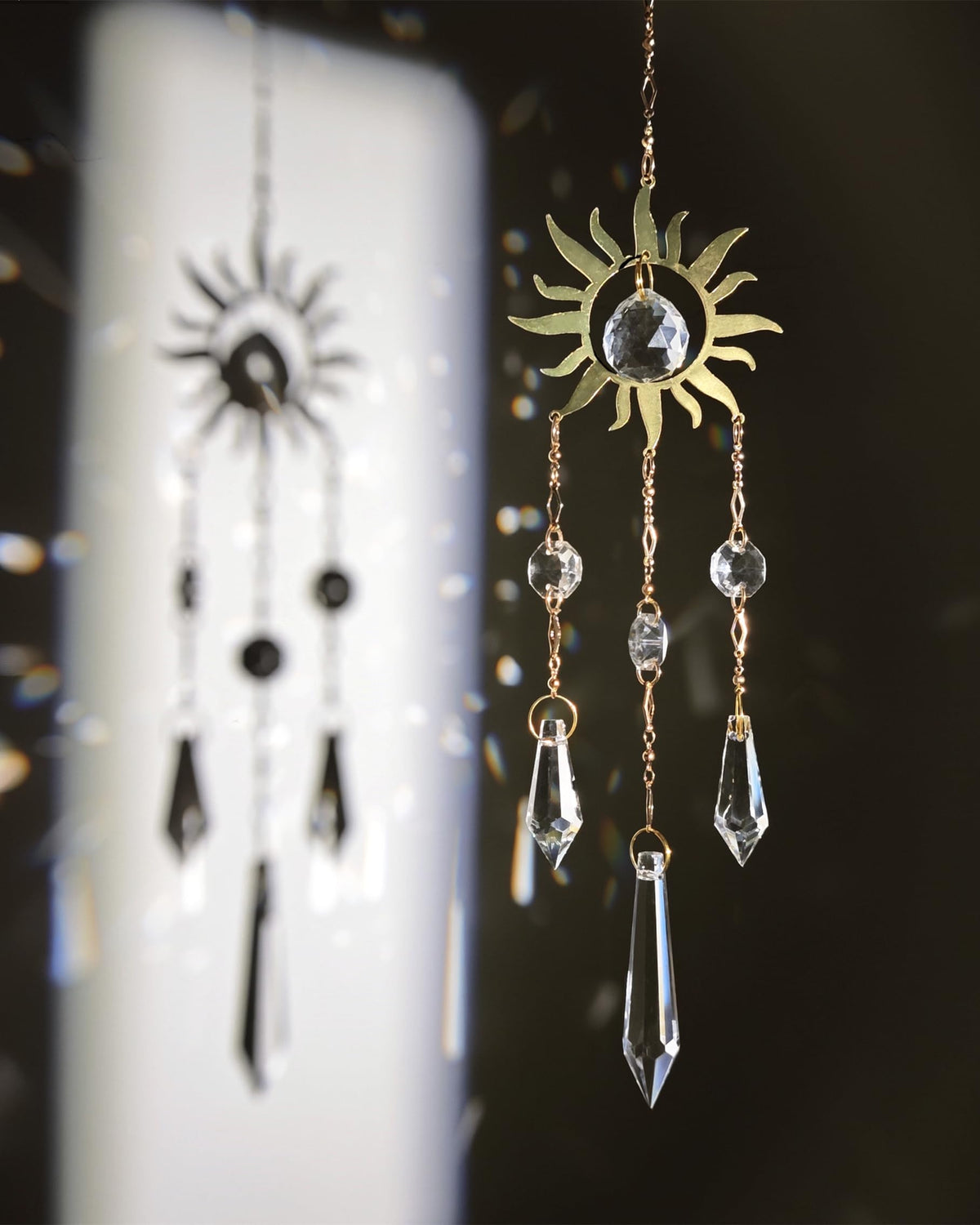 Brezalysia Rainbow Maker Crystal catches light to brighten any window.