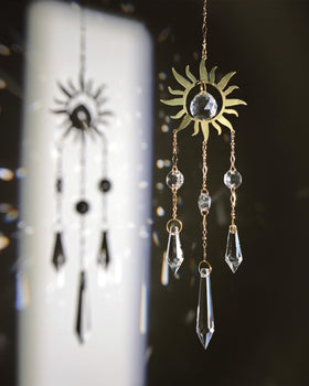 Brezalysia Rainbow Maker Crystal catches light to brighten any window.