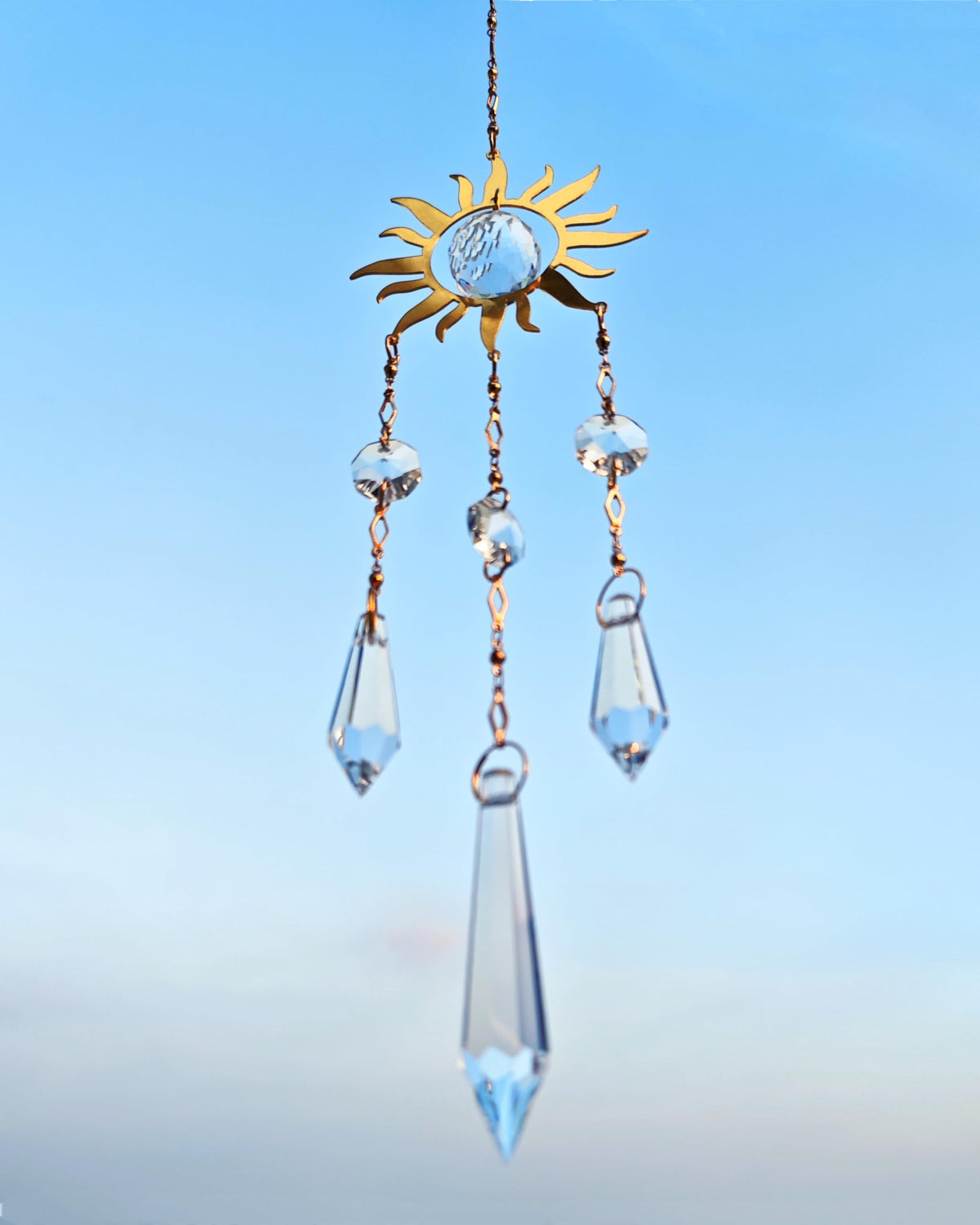 Brezalysia Windchime-Style Crystal hangs with breeze for subtle ambience.