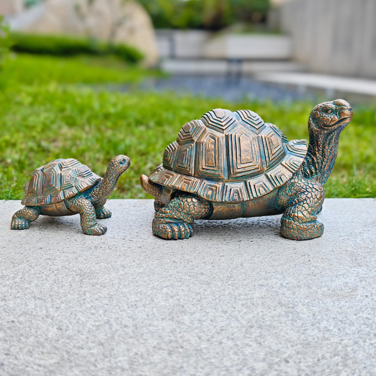 Brilliant Prospect baby turtle figurine adds charming detail to patios and lawns.