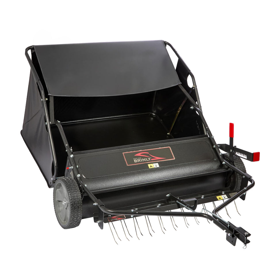 Brinly 42inch tow-behind lawn sweeper ready to collect leaves