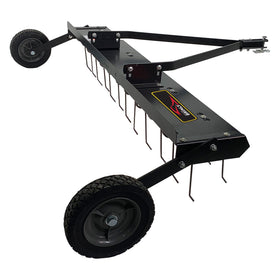 Brinly dethatcher wide coverage in use across a large yard for faster results