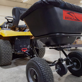 Brinly MHPK-12BH tow-behind attachments in use with Brinly system.