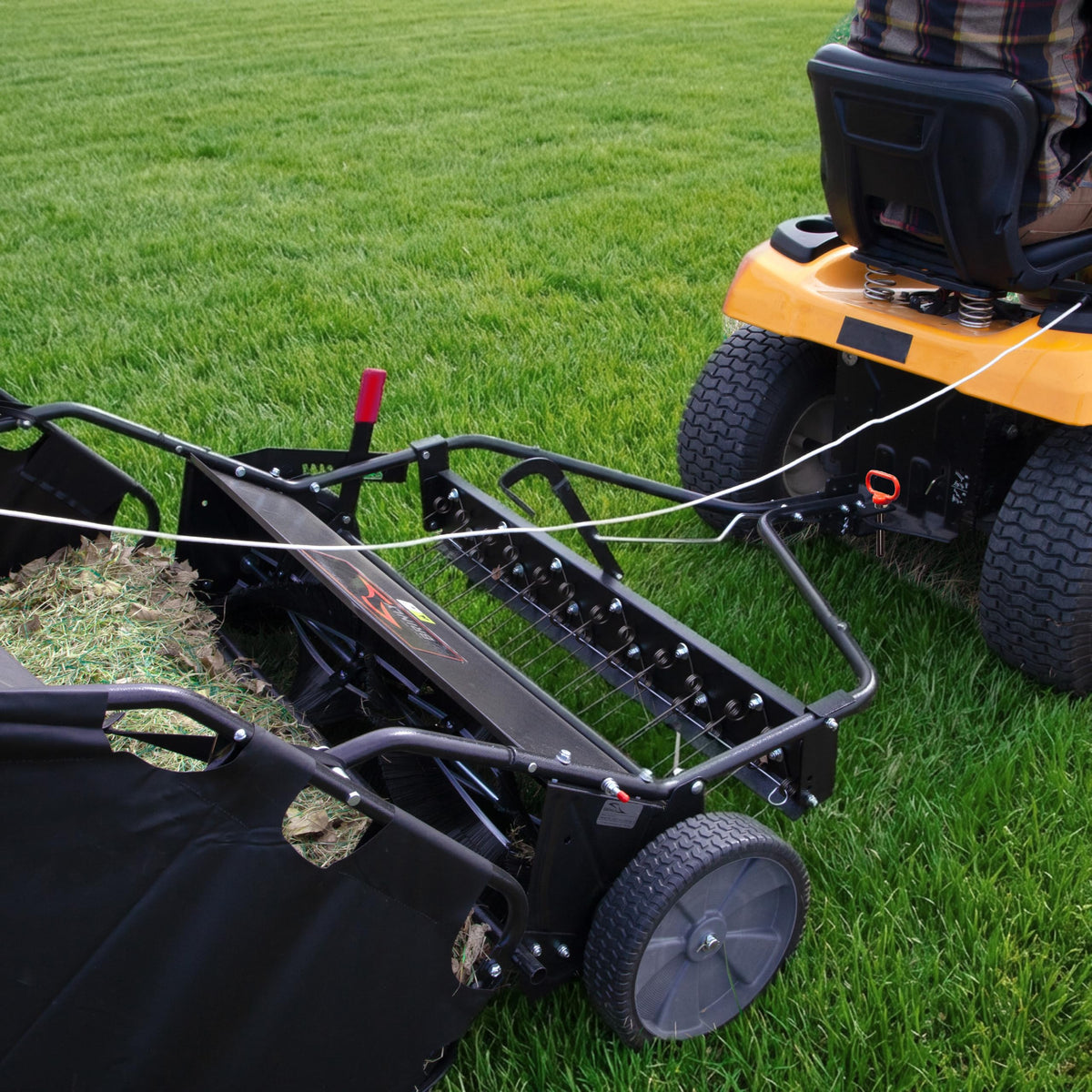 Brinly precision height adjustment control for optimal brush depth