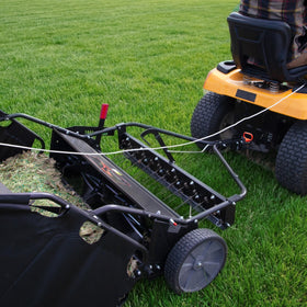 Brinly precision height adjustment control for optimal brush depth