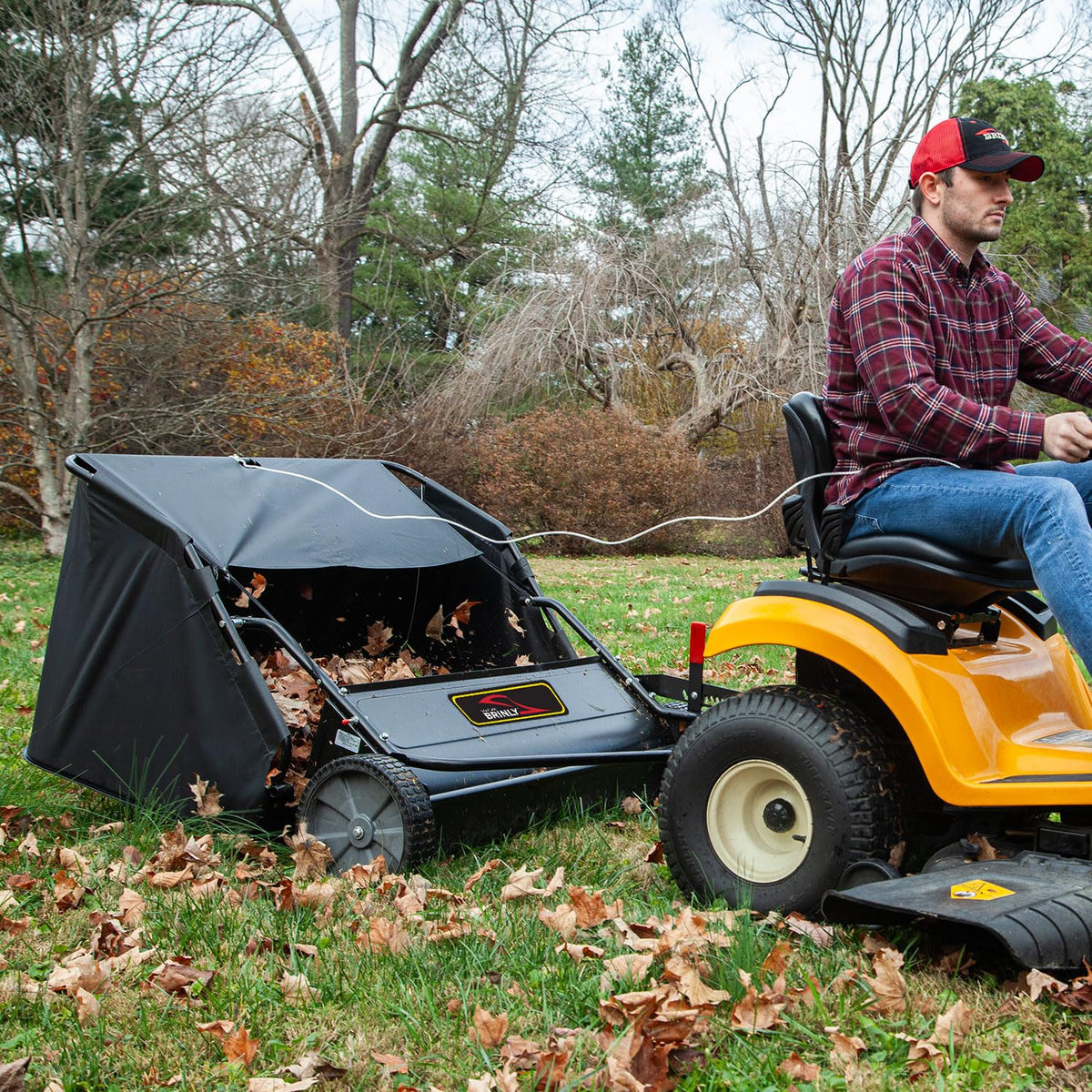 Brinly pull rope and T-handle simplify emptying from tractor seat