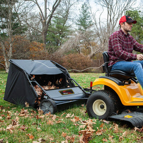 Brinly pull rope and T-handle simplify emptying from tractor seat