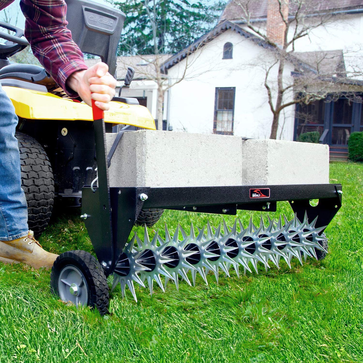 Brinly SAT2-40BH-P weight tray supports extra weight for deeper aeration