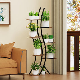 BRITEWAVE 7-tier plant shelf displays a variety of pots in a tall, organized setup.