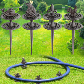 Briwooody frog hose guide stake keeps hoses tidy in garden beds.