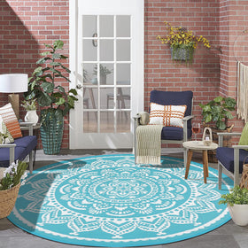 Bsmathom 6ft round rug in Flower Teal, reversible boho design for patios and decks.