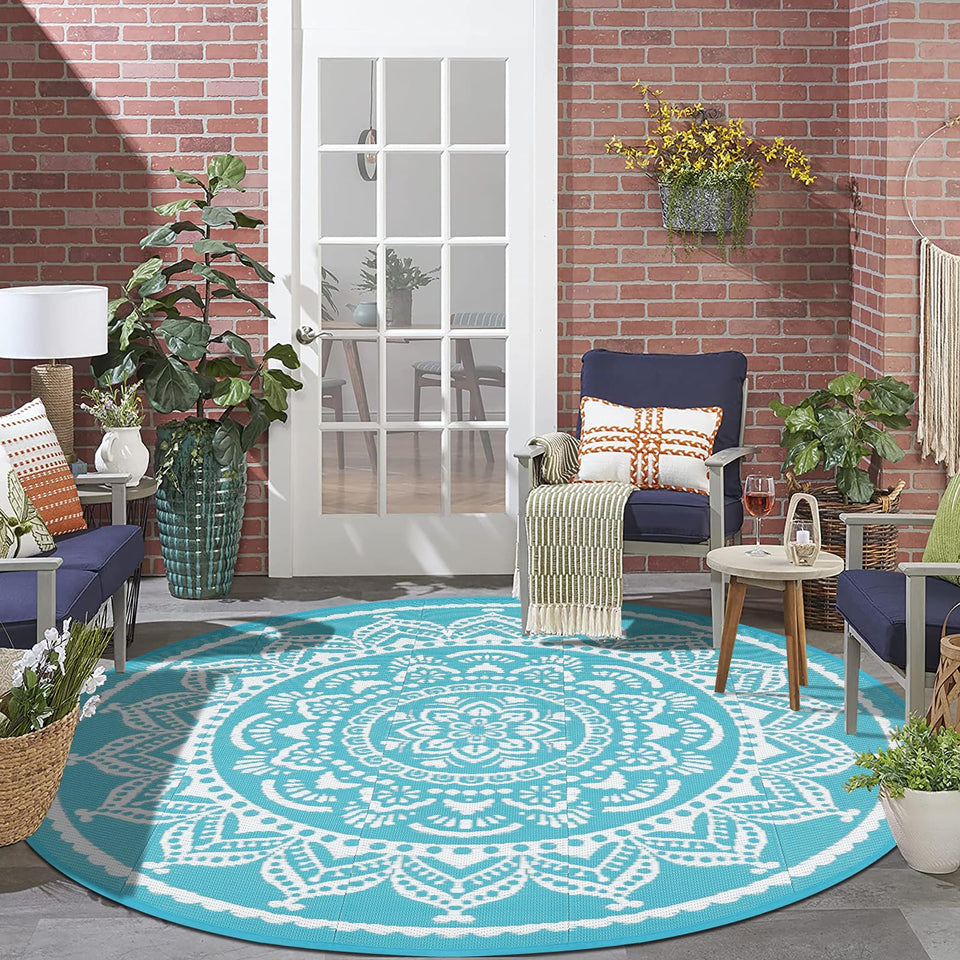 Bsmathom 6ft round rug in Flower Teal, reversible boho design for patios and decks.