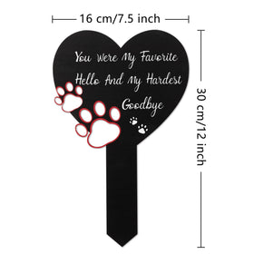BUoonyer metal cross stake features paw and heart motif for garden remembrance.