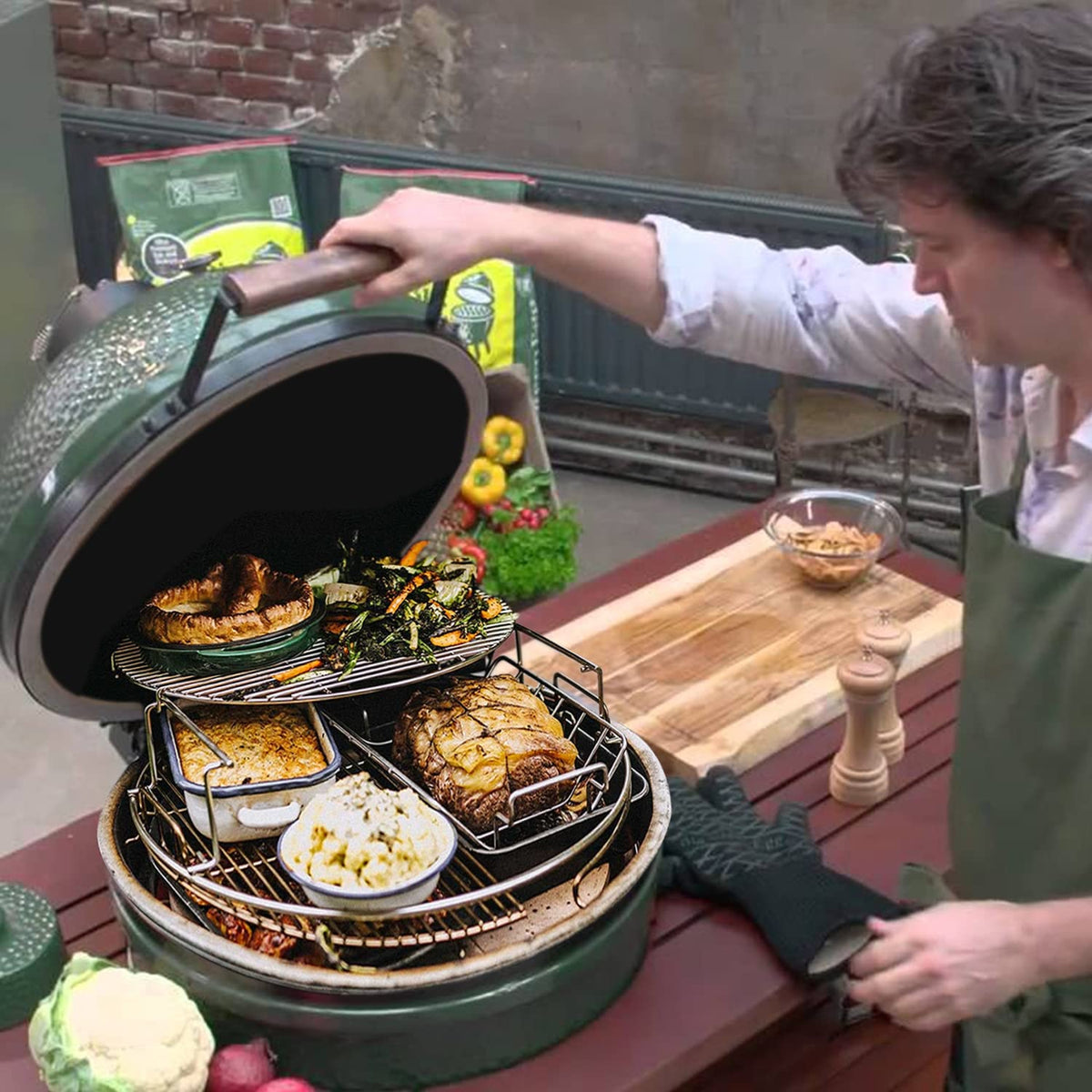 Multi-level cooking setup by Burly Grill expands space for multiple dishes.