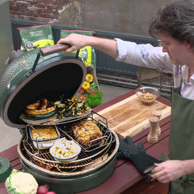 Multi-level cooking setup by Burly Grill expands space for multiple dishes.