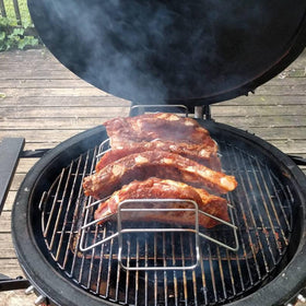 Burly grill vertical design promotes even heat and easy handling.