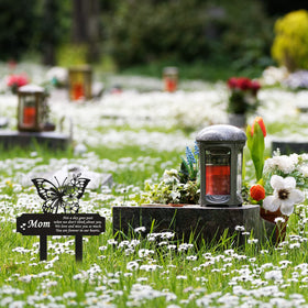 Buryeah garden memorial stake features warm words and floral accents