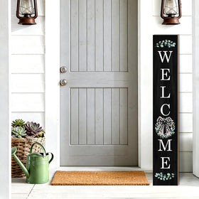Buxjexh eucalyptus bow detail adds rustic farmhouse charm at entryways.