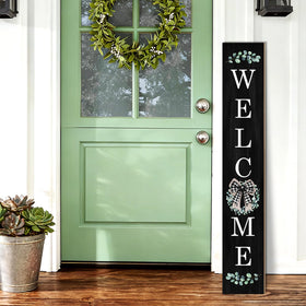 Buxjexh eucalyptus-wreath welcome sign for year-round porch appeal.