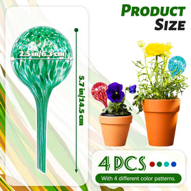 Bvrbaory glass bulbs inserted into soil delivering steady moisture to plants.
