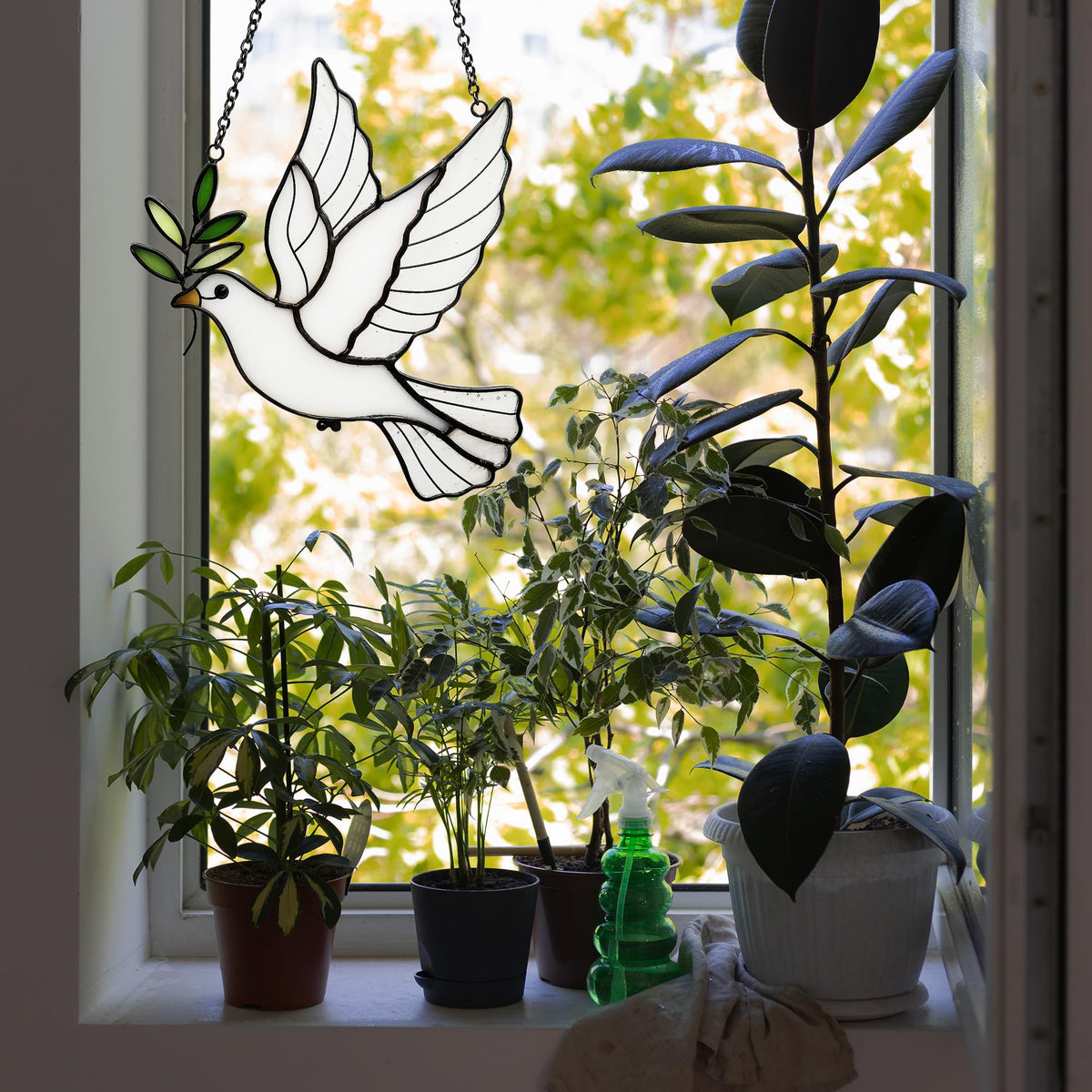 BXLZ Dove Suncatcher garden and patio decor catching sunbeams.