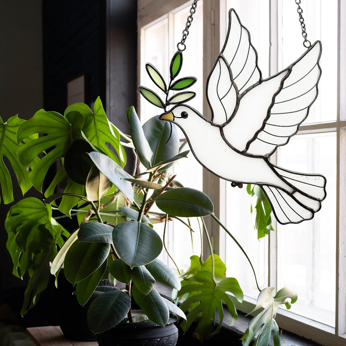 BXLZ White Dove Suncatcher on hallway window adds subtle charm.