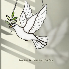 BXLZ White Dove Suncatcher hanging on a window for indoor/outdoor use.