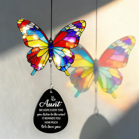 BYHEARTOHOME wind chime sunlit butterfly detail enhances garden ambiance.