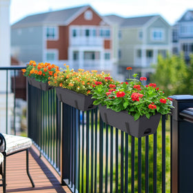 CADUKE railing planter boxes mounted on a rail on a balcony outdoor scene.