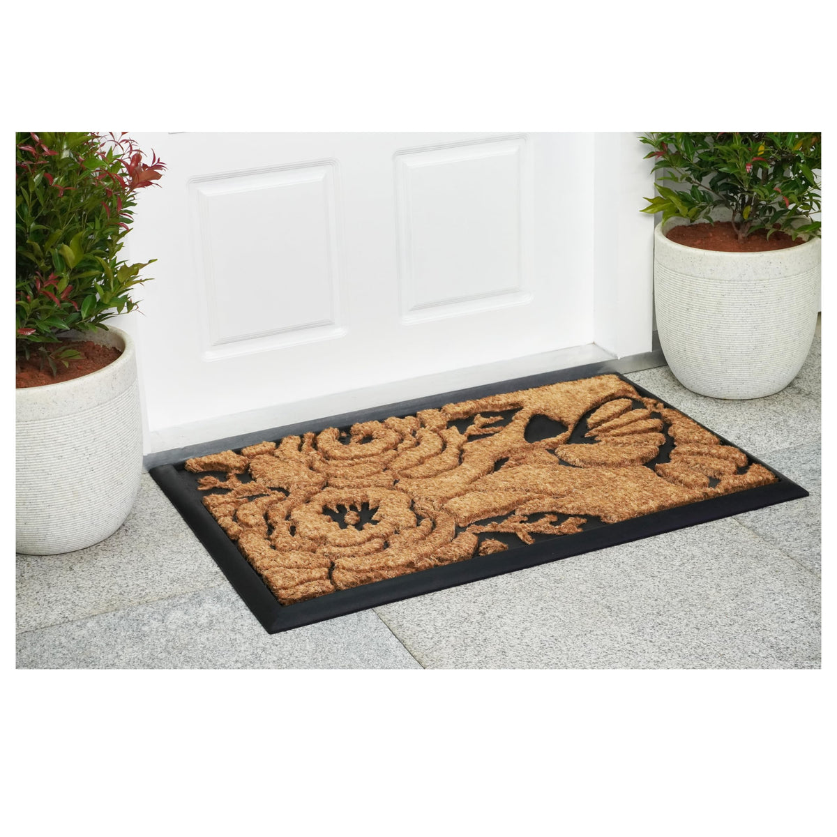 Calloway Mills Hummingbird Haven doormat shows coir center for effective shoe scraping.