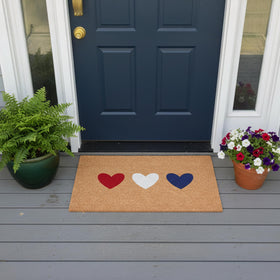 Calloway Mills Patriotic Hearts Doormat seasonal pattern adds curb appeal.