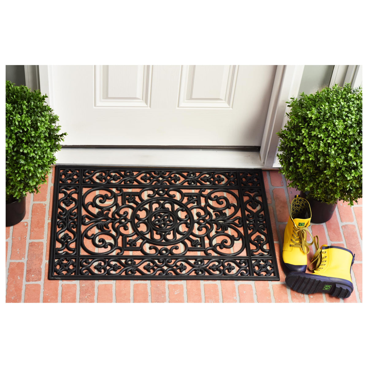 Calloway Mills Utopia porch mat on stone steps for outdoors.