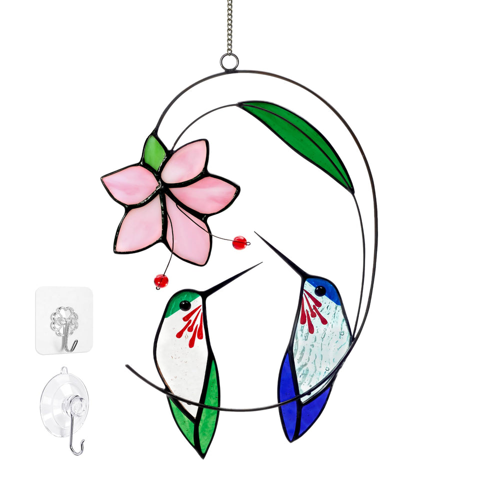 Calmpathz hummingbird suncatcher on a branch with flowers casting color on walls.