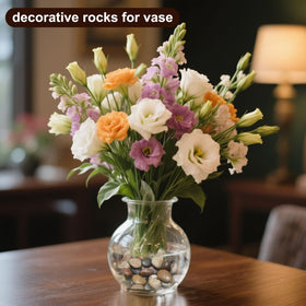 Calofulston river rocks decorate patios with natural color and rounded textures.