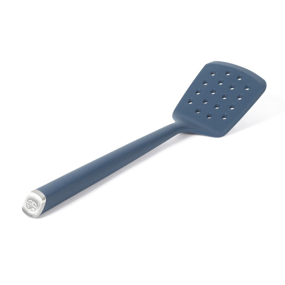 Calphalon Edge silicone slotted turner navy for gentle flipping and draining.